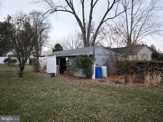 view of property exterior featuring a lawn