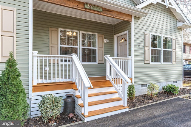 property entrance with covered porch