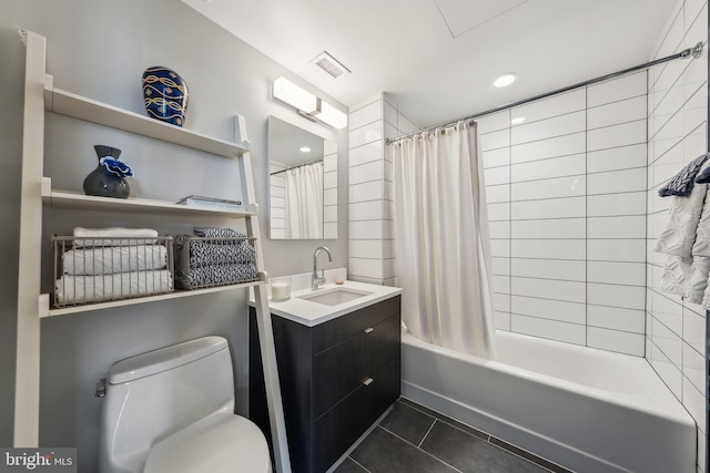 full bathroom featuring toilet, tile patterned flooring, shower / bathtub combination with curtain, and vanity