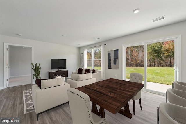 dining room with light hardwood / wood-style flooring