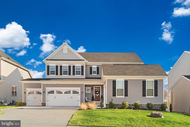 view of front of house with central AC unit, a garage, and a front lawn