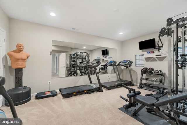 exercise room with carpet flooring