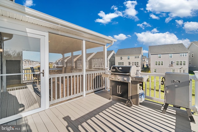 wooden terrace with grilling area