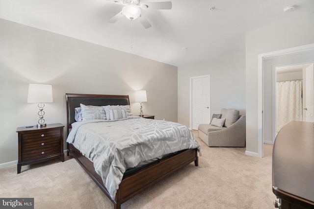 bedroom with light carpet and ceiling fan