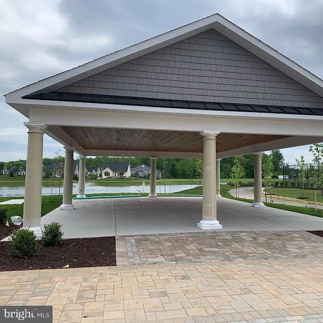 view of community featuring a gazebo and a water view