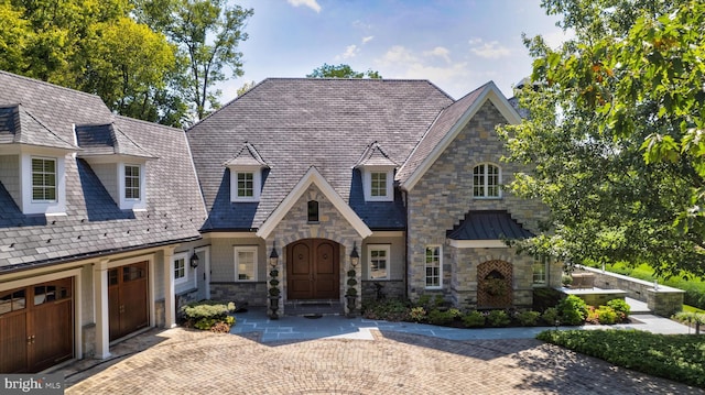 view of front of home with a garage