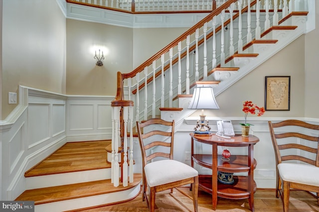 stairway featuring wood-type flooring