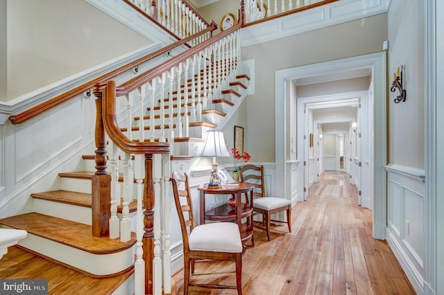 stairway featuring wood-type flooring