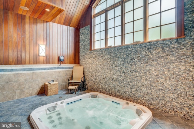 bathroom with tile patterned floors, wooden ceiling, tile walls, and vaulted ceiling