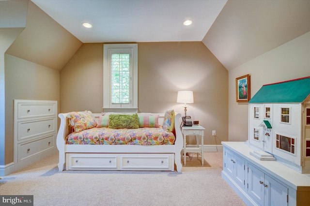 carpeted bedroom featuring vaulted ceiling