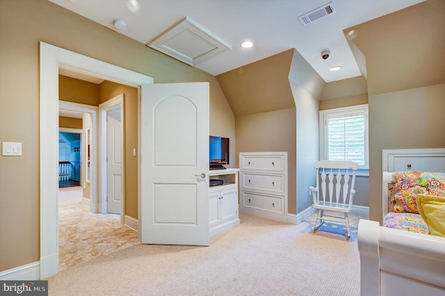 carpeted bedroom featuring lofted ceiling