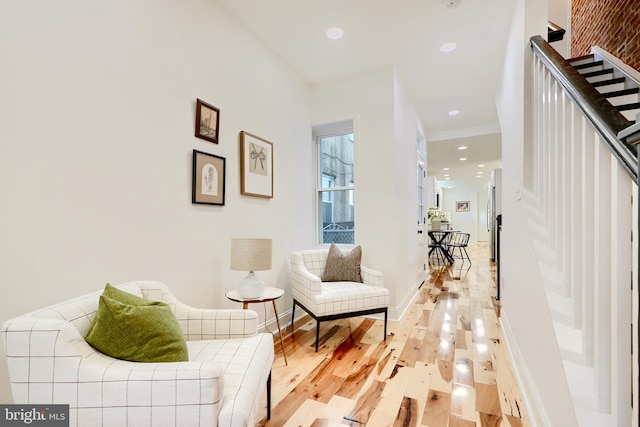 living area featuring light hardwood / wood-style floors