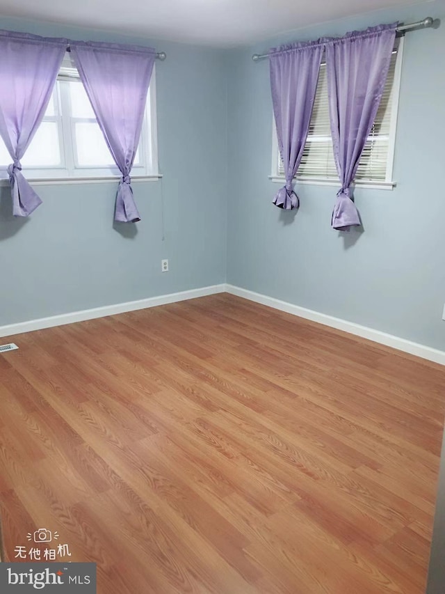 empty room featuring light wood-type flooring