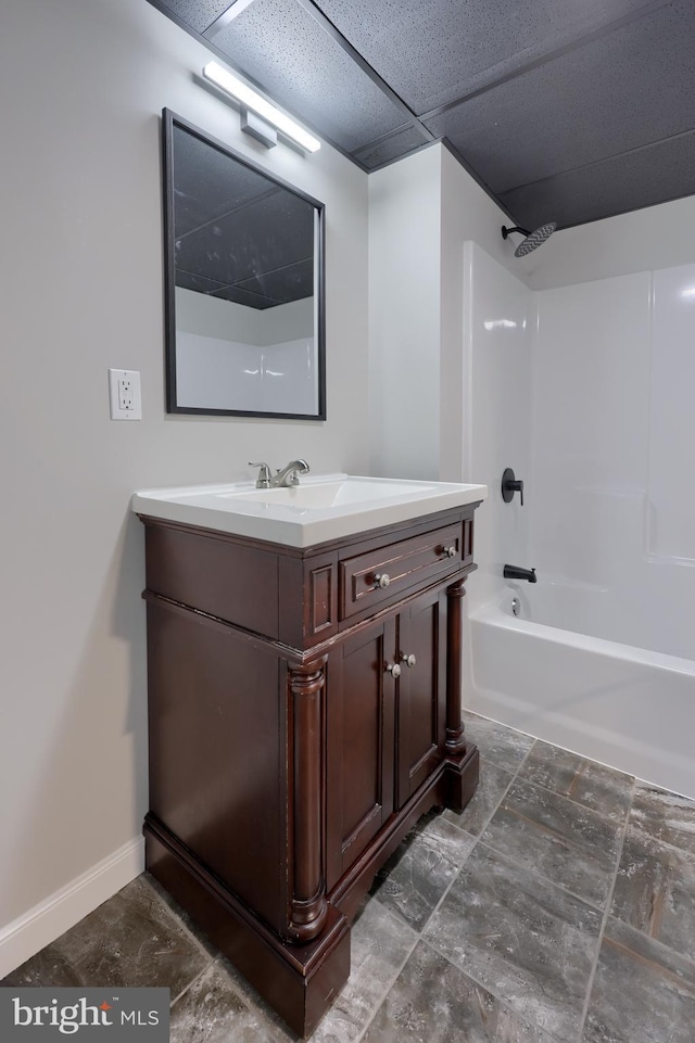 bathroom with vanity and bathtub / shower combination