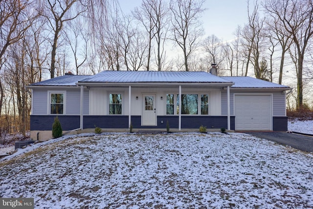 single story home with a garage