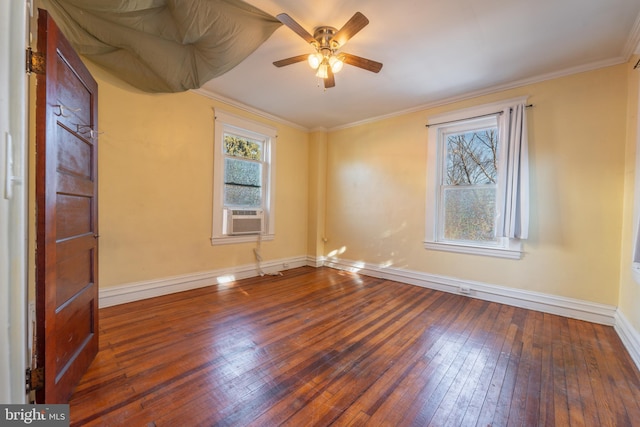 empty room with crown molding, cooling unit, ceiling fan, and dark hardwood / wood-style flooring