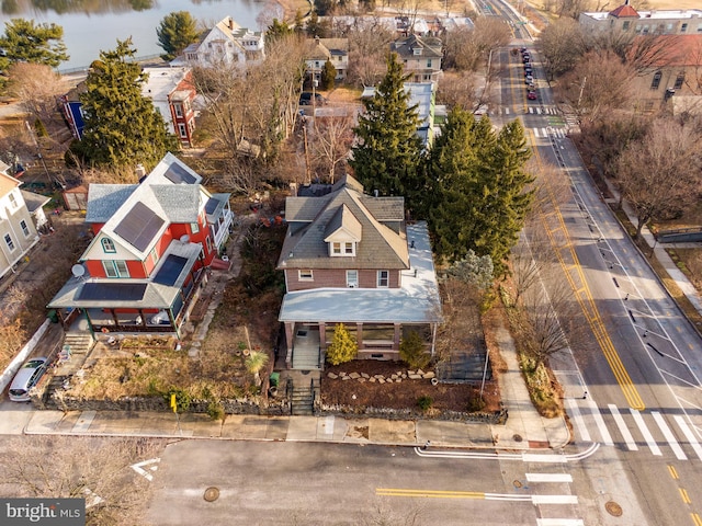 drone / aerial view with a water view