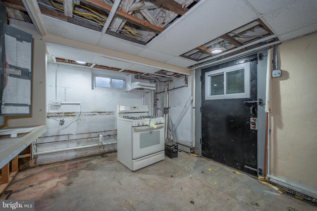 basement featuring a paneled ceiling