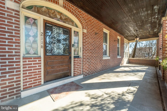 doorway to property with a porch