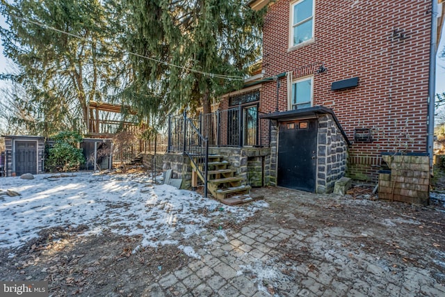 view of snow covered house