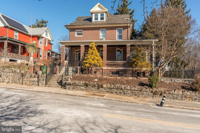 view of front facade featuring covered porch