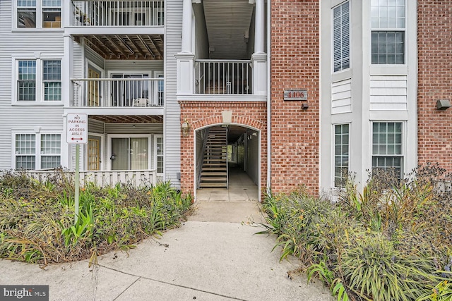 4406 Silverbrook Ln Unit J004, Owings Mills, MD 21117 - property entrance featuring brick siding