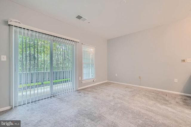 unfurnished room featuring carpet flooring