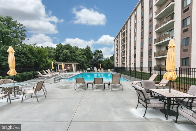 view of swimming pool featuring a patio