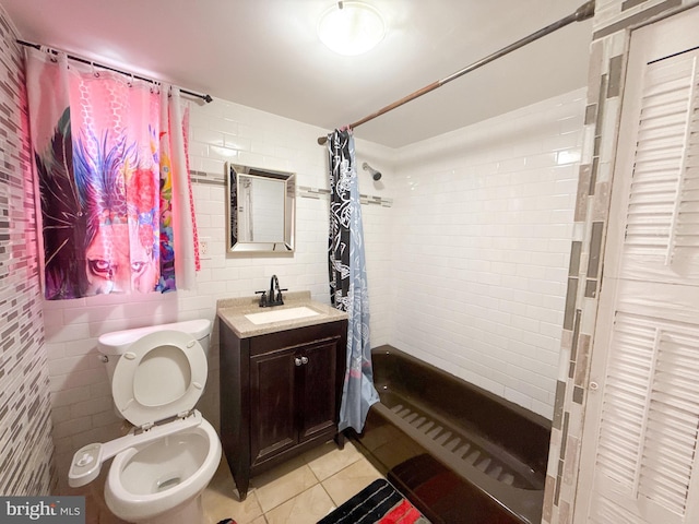 bathroom featuring walk in shower, vanity, tile walls, tile patterned flooring, and toilet