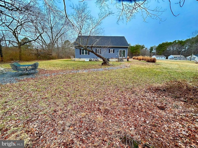 exterior space with a front yard