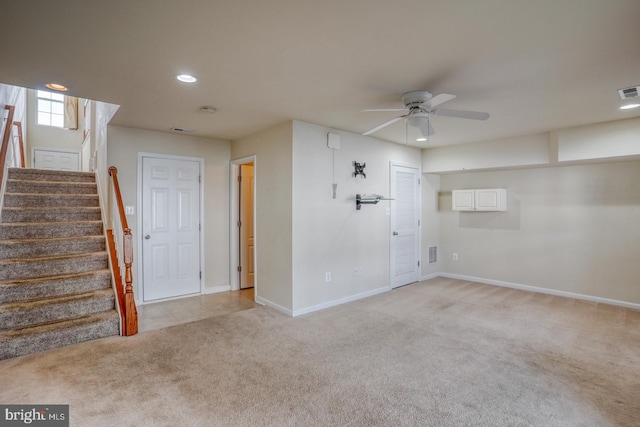 carpeted empty room with ceiling fan