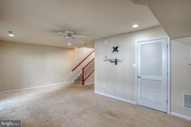 interior space with ceiling fan