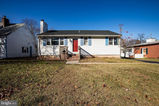 view of front of home with a front lawn