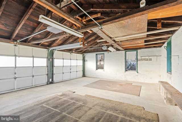 garage featuring a garage door opener