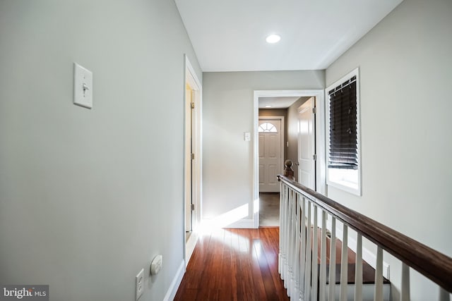 hallway featuring dark hardwood / wood-style flooring