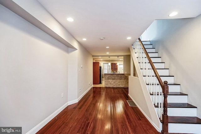 hall featuring dark hardwood / wood-style floors