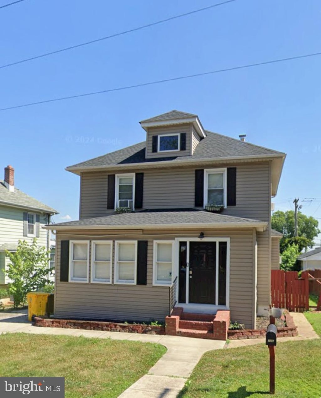 view of front property with a front lawn