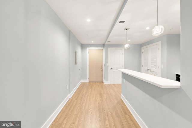 corridor featuring light wood-type flooring