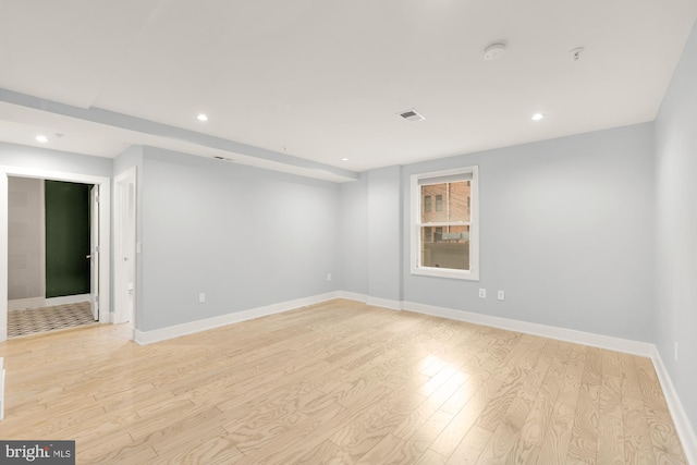 unfurnished room featuring light wood-type flooring