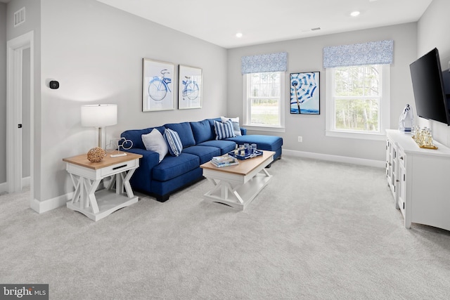 living room with light colored carpet