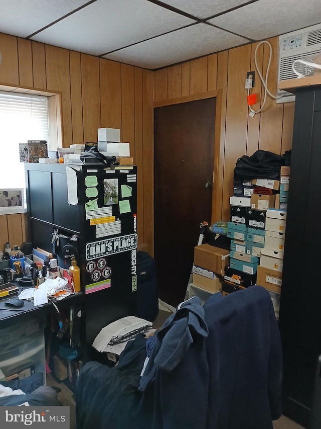 home office with wood walls