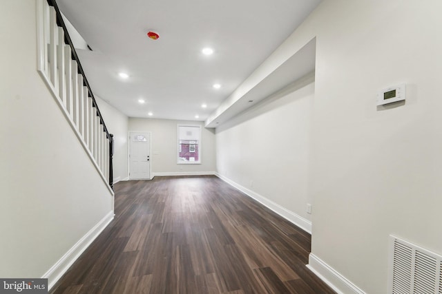 interior space with dark hardwood / wood-style flooring