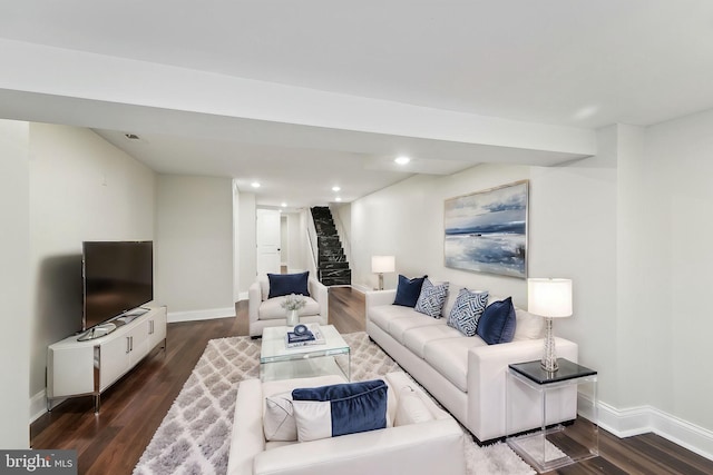 living room featuring dark hardwood / wood-style floors