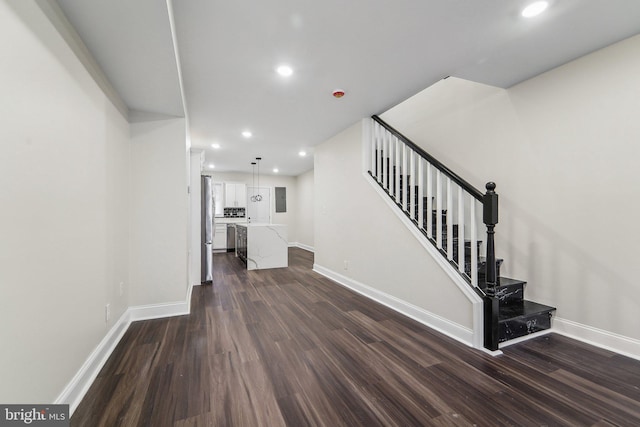 interior space with dark hardwood / wood-style flooring