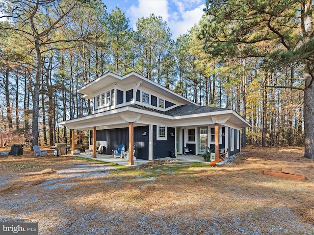 view of front of property featuring a patio