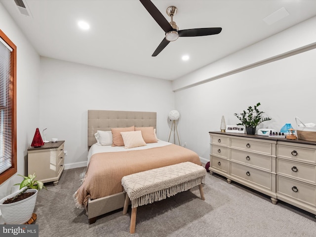 carpeted bedroom with ceiling fan