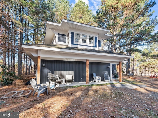 view of property exterior with a patio