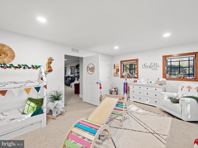 playroom with light colored carpet