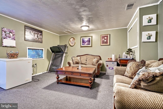 living room with carpet flooring, a textured ceiling, and crown molding