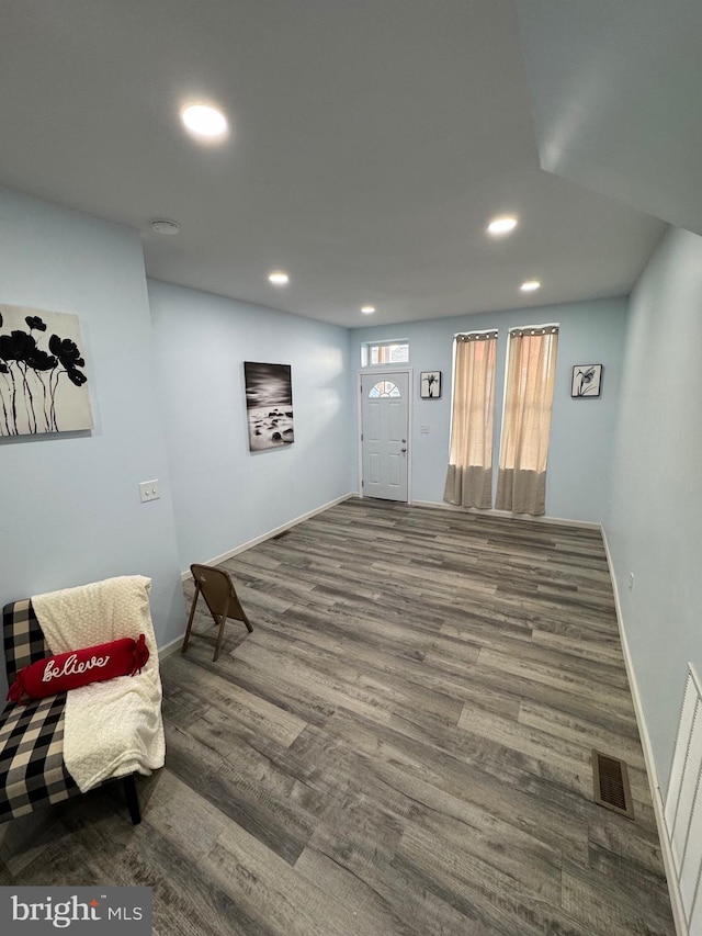 interior space with hardwood / wood-style flooring